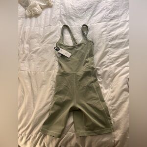 NWT Aritizia Shorts Romper with Criss Cross back size S